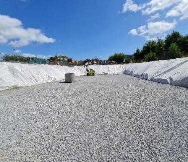 Compacted hardcore surface prepared ahead of construction